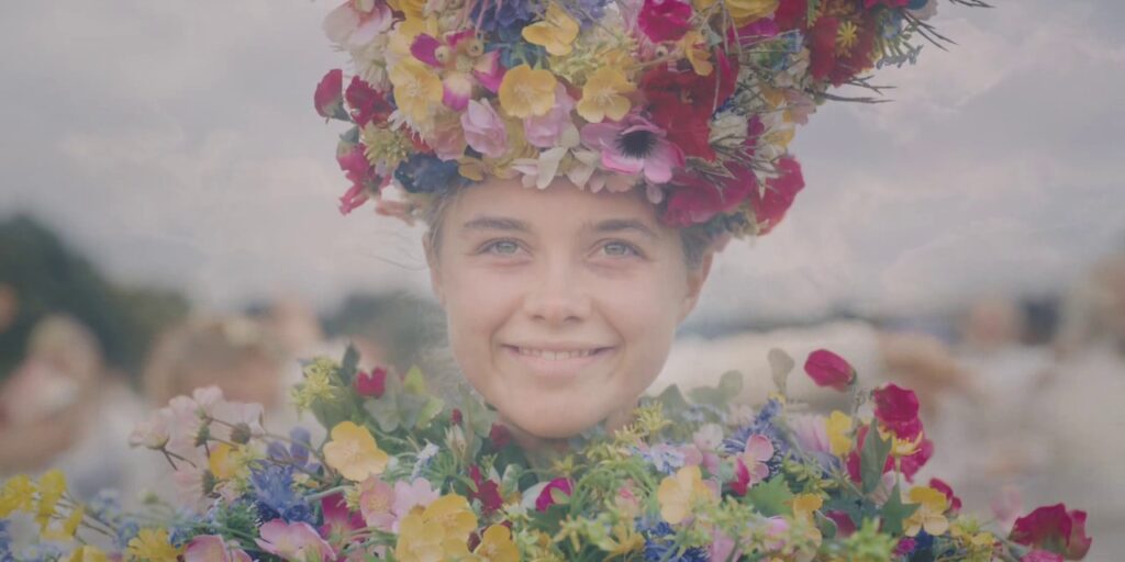 Florence Pugh wearing the flower suit from Midsommar